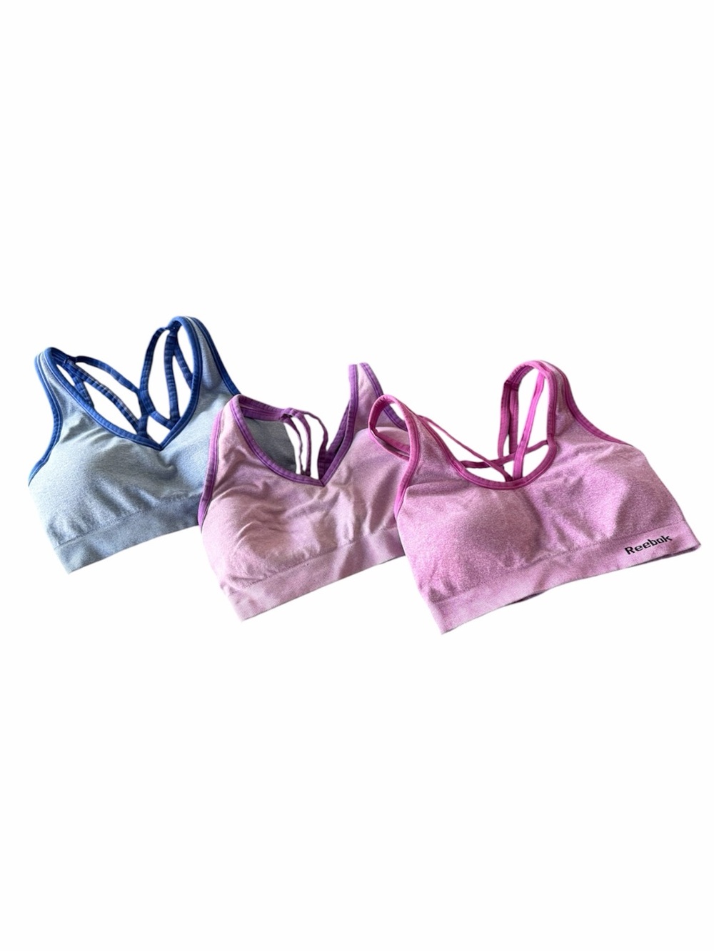 Set of three Reebok strappy sports bras, size xs